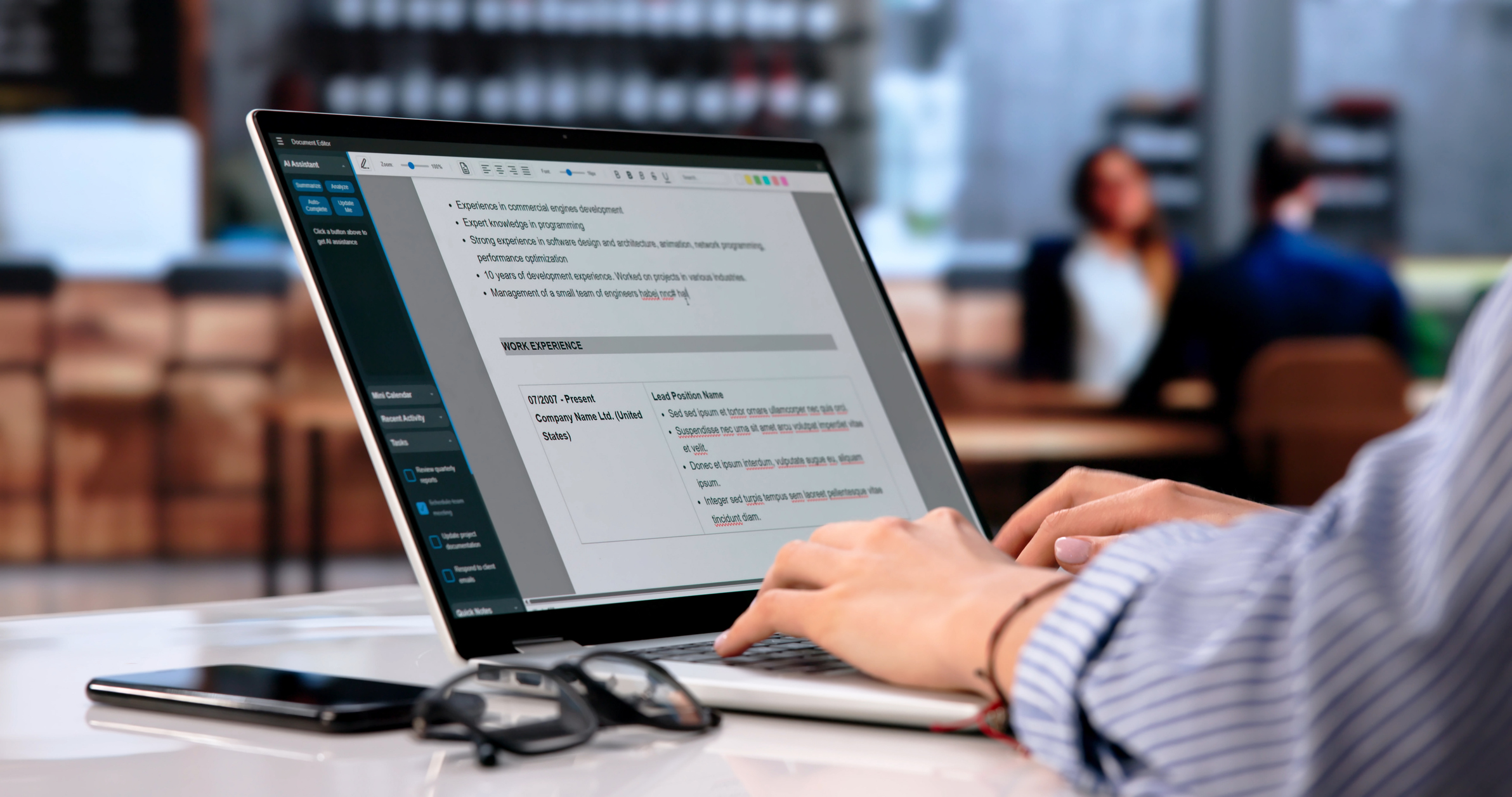 Young Woman Writes Professional Resume On Laptop